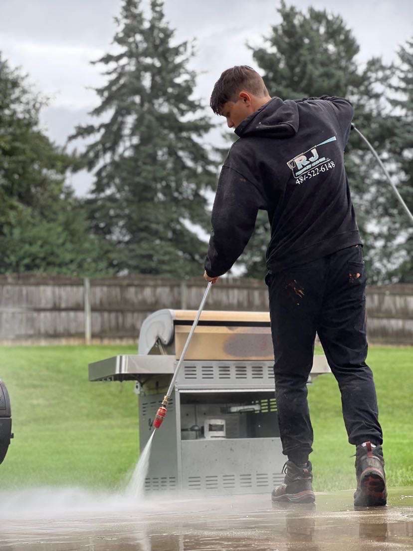 RJ Pressure Washing cleaning a deck